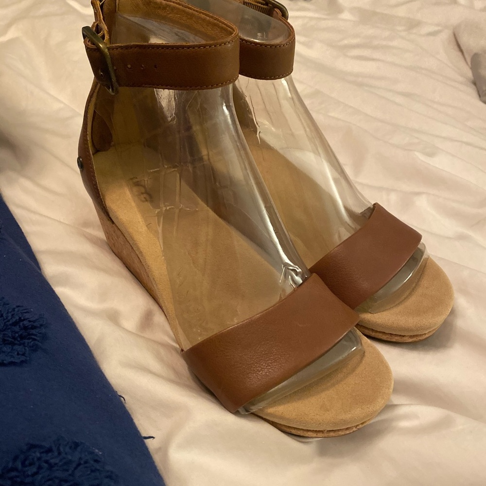 Brand new woman’s UGG wedges size 9.